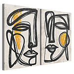 Impression sur toile modulaire Deux visages dessinés en noir et jaune